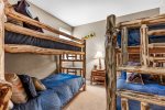 Camp Room & Beaver Room Shared Bathroom with 2 Toilet Rooms & 1 Standing Shower - Lower Level